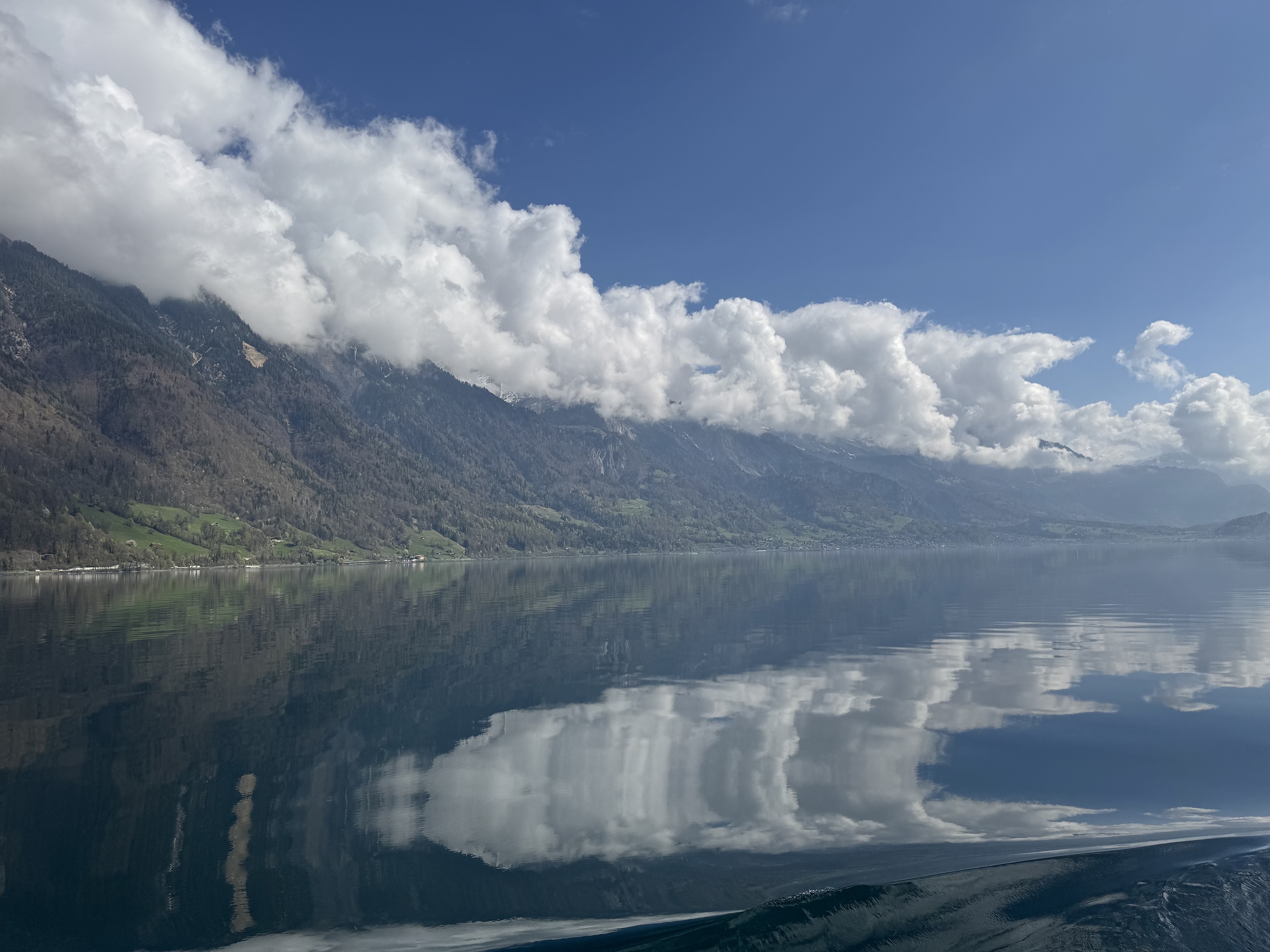 So clear and reflective, the clouds are mirrored in the lake